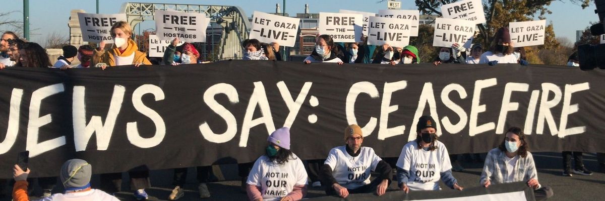 banner reads: Jews say: cease-fire