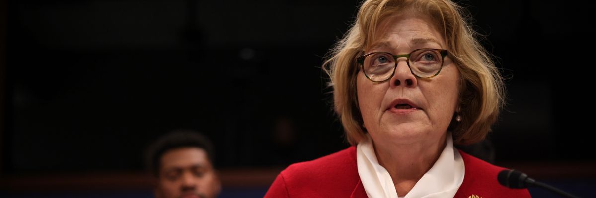 Barbara Leaf, wearing a red blazer and white scarf, speaks to the House Foreign Affairs Committee