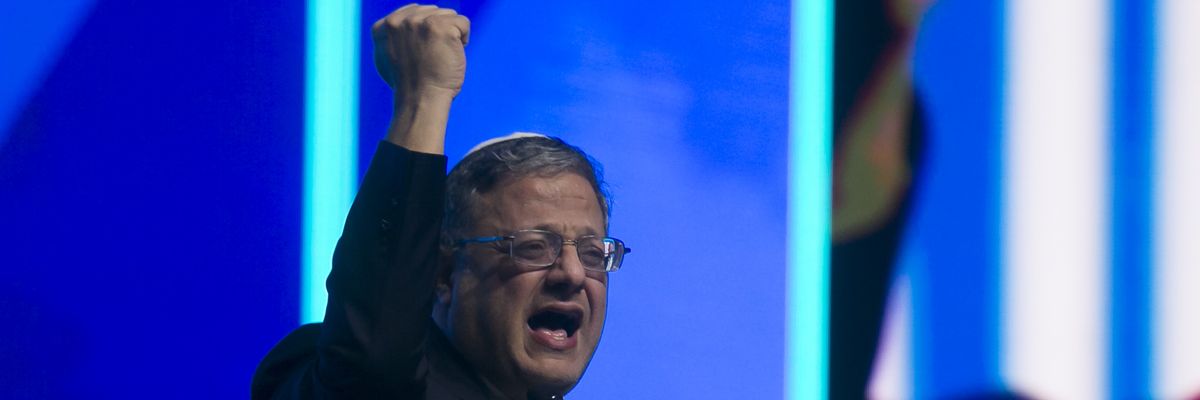 Ben Gvir speaks with raised fist.