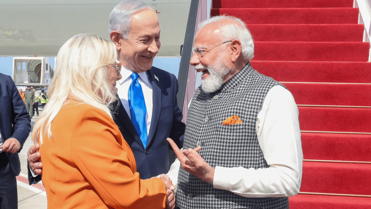 Benjamin and Sara Netanyahu greet Narendra Modi upon his arrival in Israel