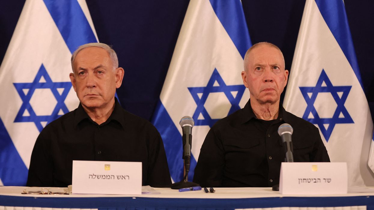 Benjamin Netanyahu and Yoav Gallant are seated next to each other