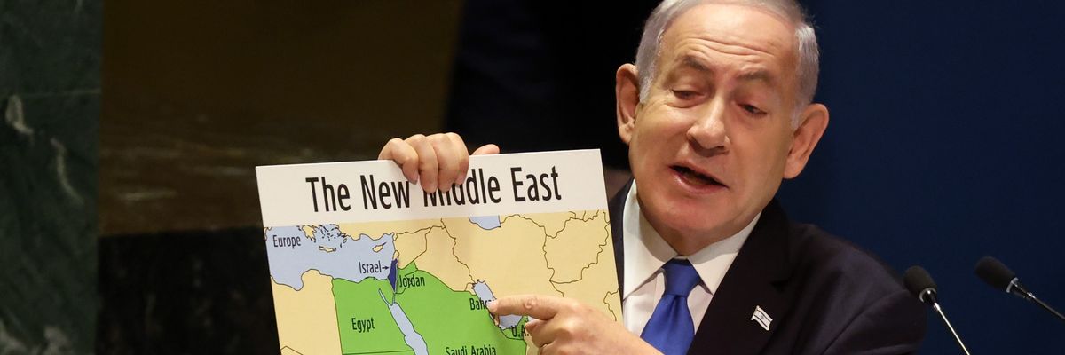 Benjamin Netanyahu holds a map of the Middle East without Palestine