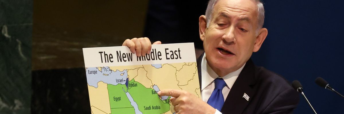 Benjamin Netanyahu holds a map of the Middle East without Palestine
