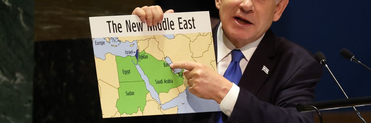 Benjamin Netanyahu holds a map of the Middle East without Palestine