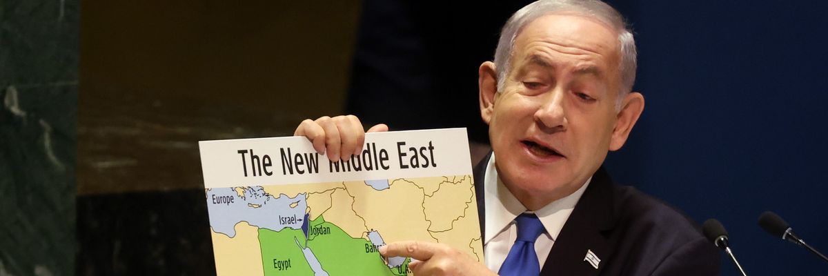 Benjamin Netanyahu holds a map of the Middle East without Palestine