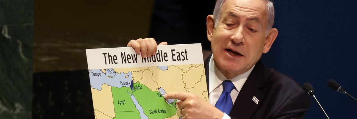 Benjamin Netanyahu holds a map of the Middle East without Palestine