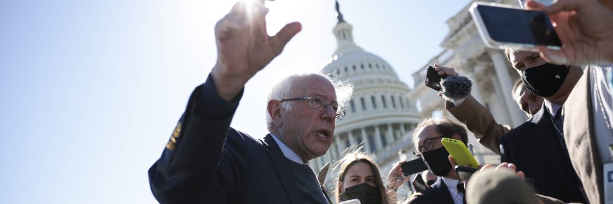 Bernie Sanders speaks with reporters