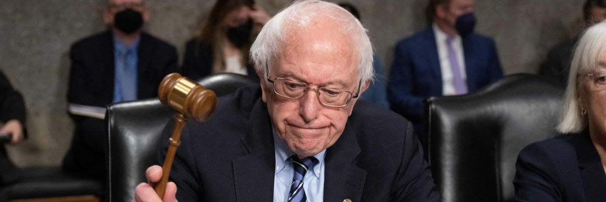 Bernie Sanders uses his gavel during a Senate HELP Committee hearing