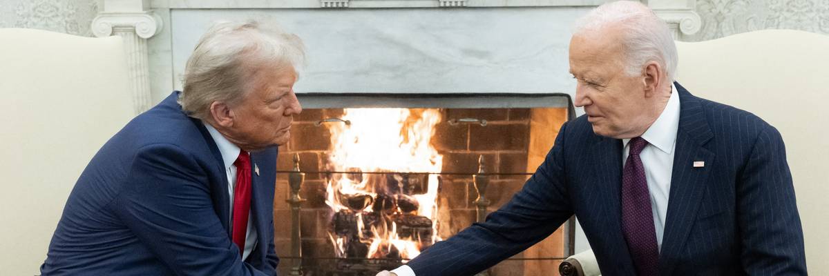 Biden and Trump shake hands.
