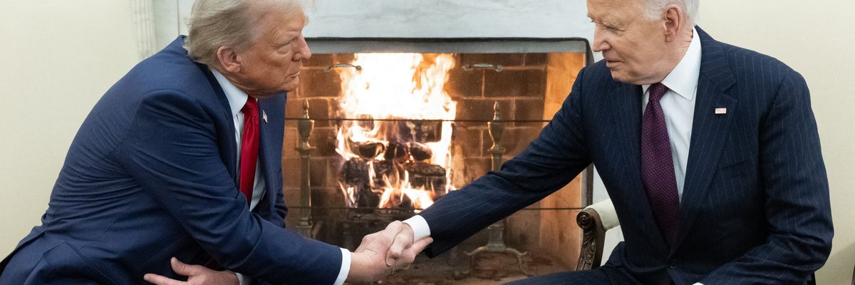 Biden and Trump shake hands.