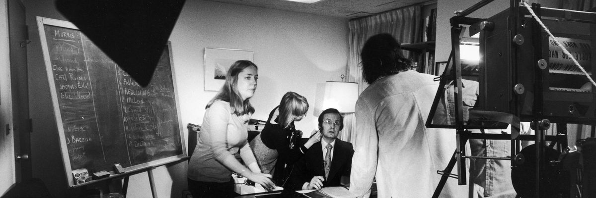 Bill Moyers being made up for TV.