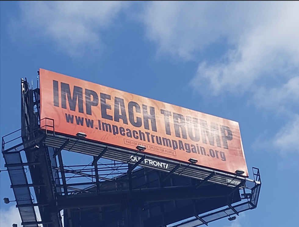 billboard that says impeach trump