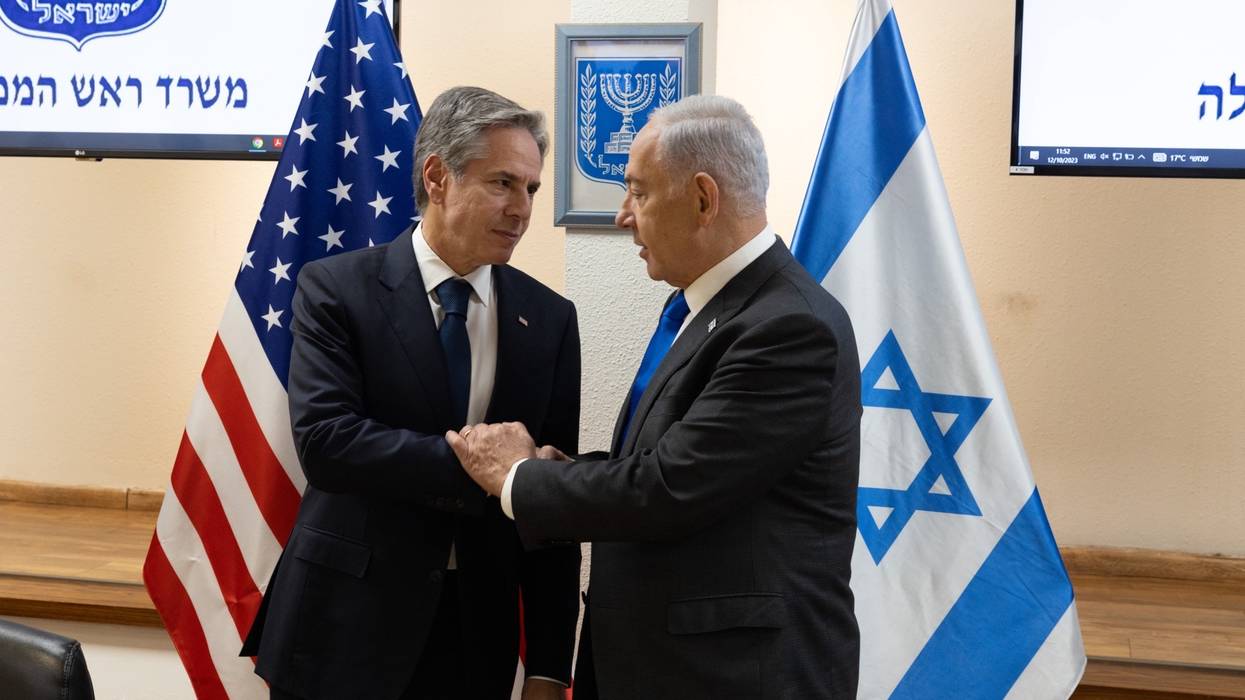 Blinken shakes Netanyahu's hand