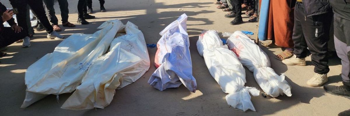 Bodies are mourned in Gaza.