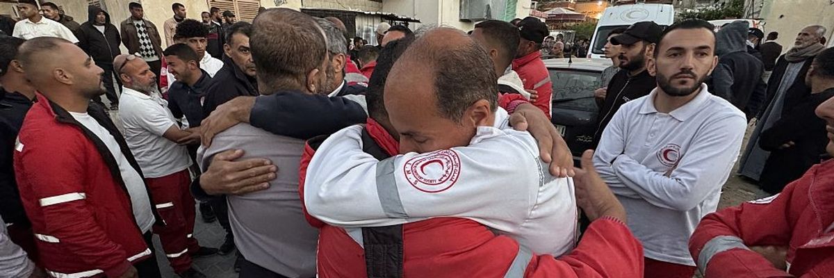 Bodies of civil defense members killed by Israel in Gaza brought to Nasser Hospital