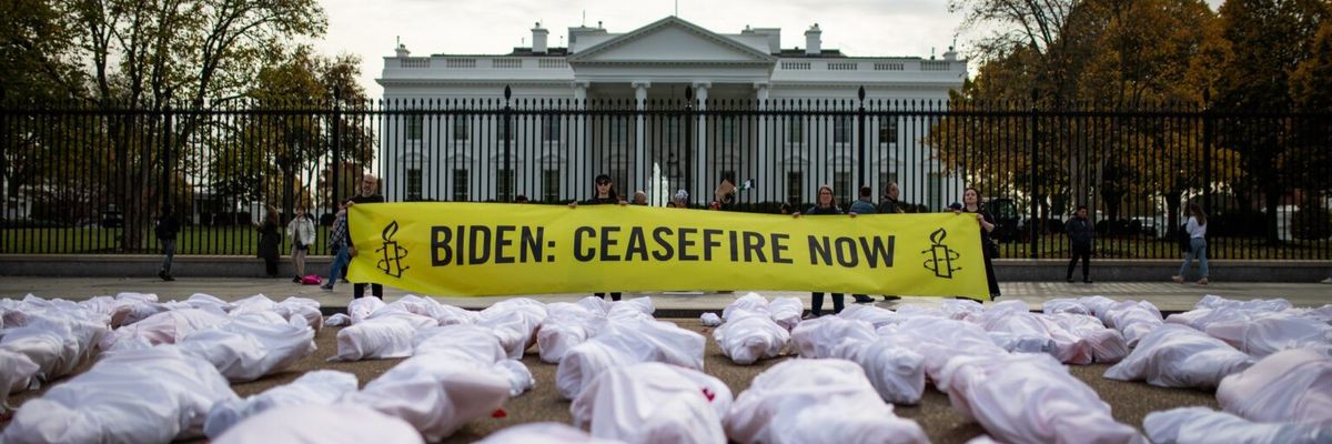 Body bags are laid in front of the White House as part of a protest calling for a Gaza cease-fire.