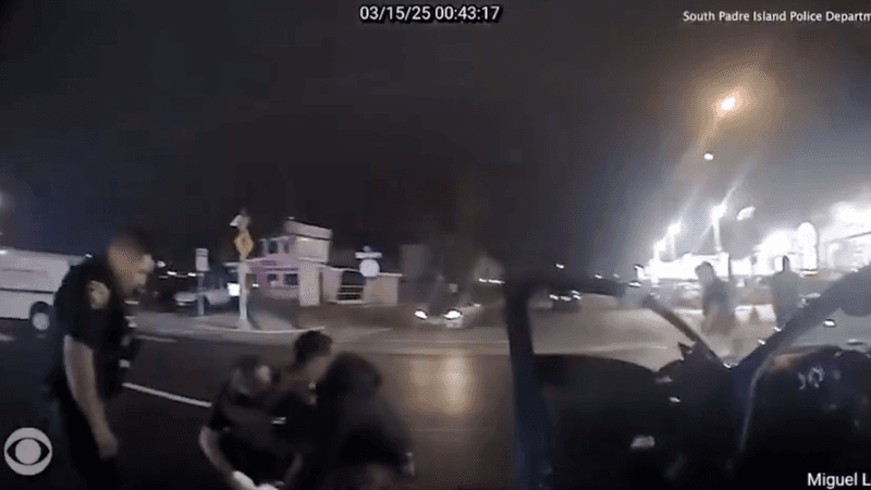 Body camera footage shows federal immigration agents and police officers surrounding Ruben Ray Martinez