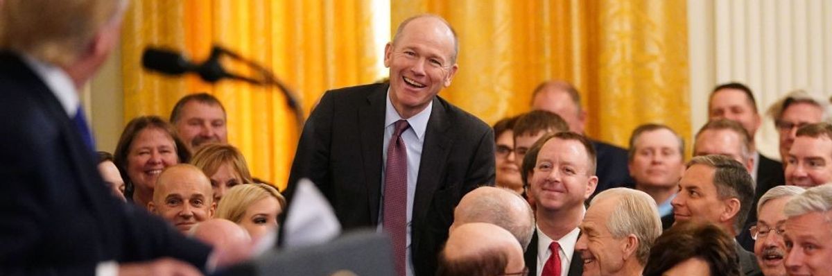 Boeing CEO Dave Calhoun and politicians.