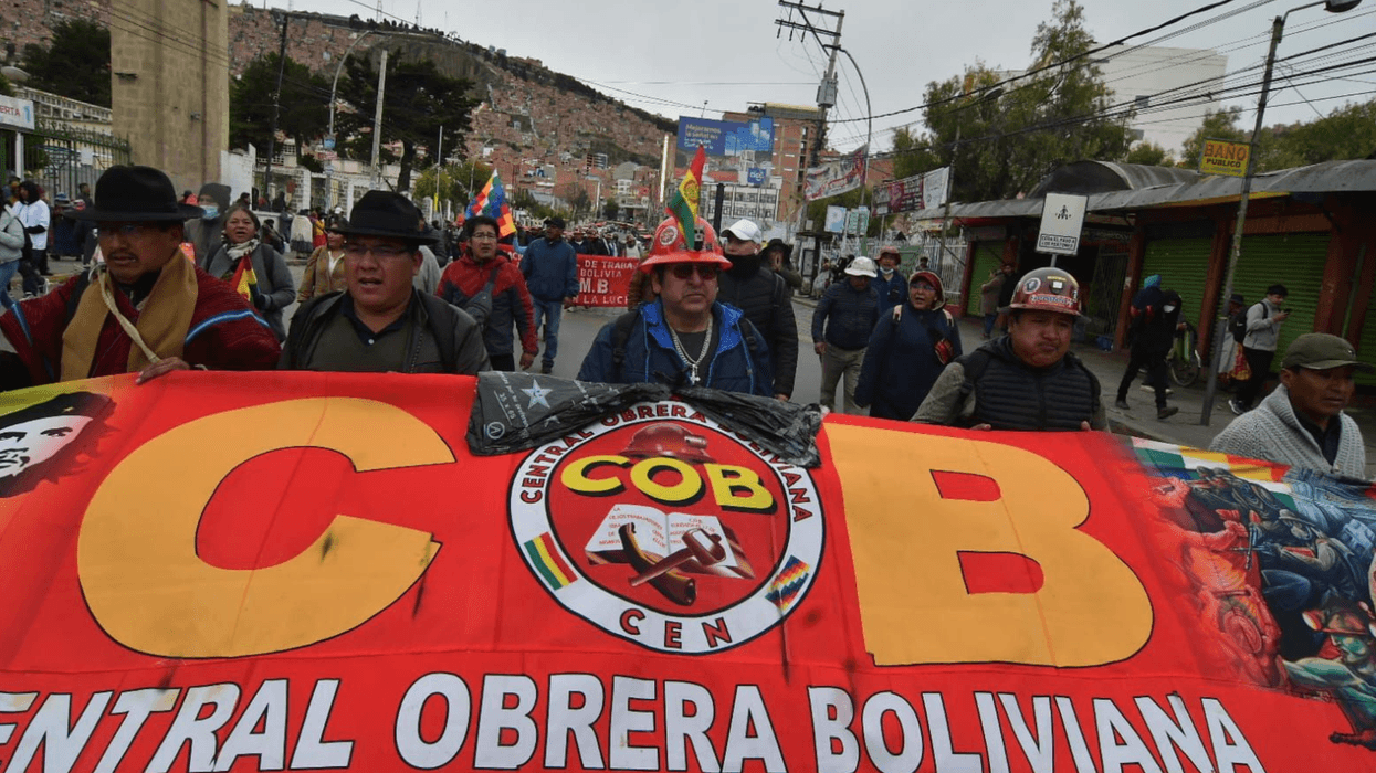 Bolivian miners march through La Paz
