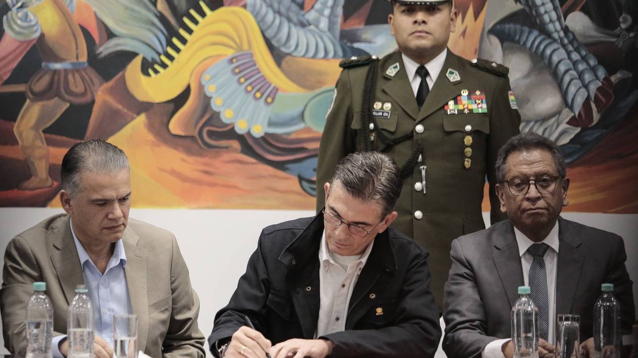 Bolivian President Rodrigo Paz signs promulgation of the state o