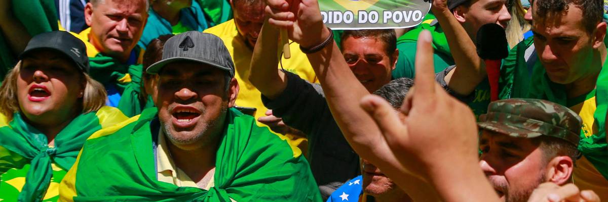 Bolsonaro supporters rally outside of an army building