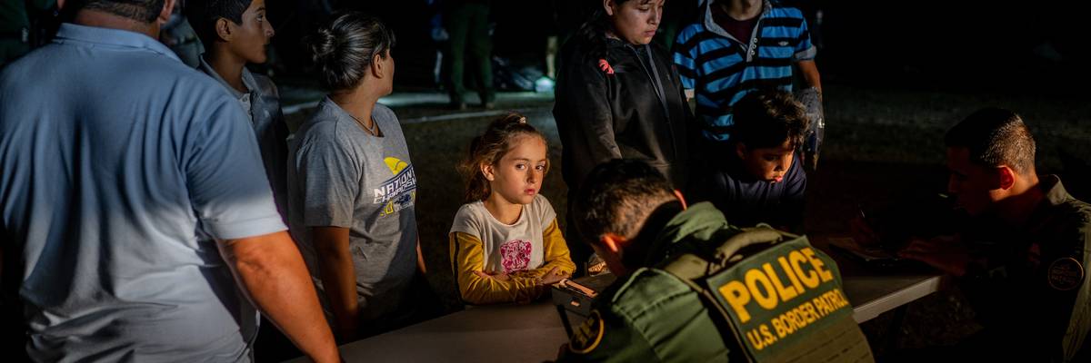 Border Patrol processing migrants