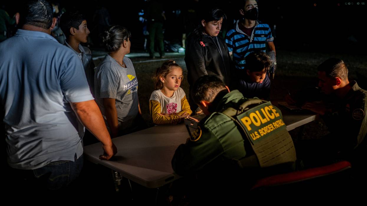 Border Patrol processing migrants