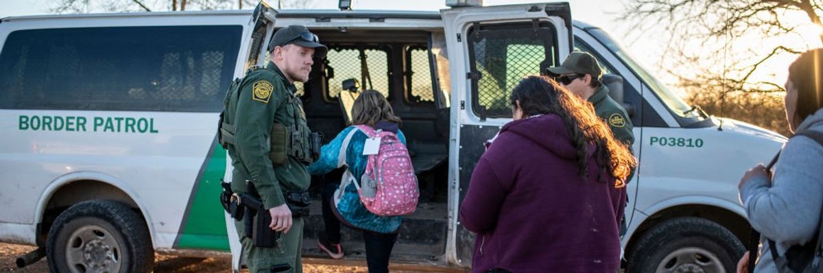 Border Patrol takes migrants into custody