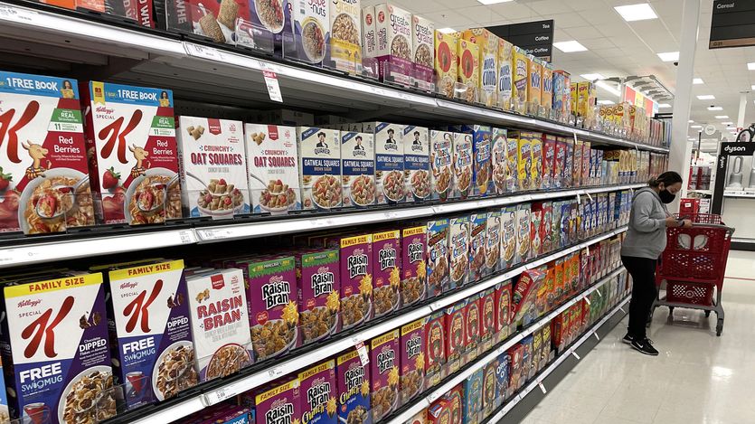 Boxes of cereal are displayed on a shelf 