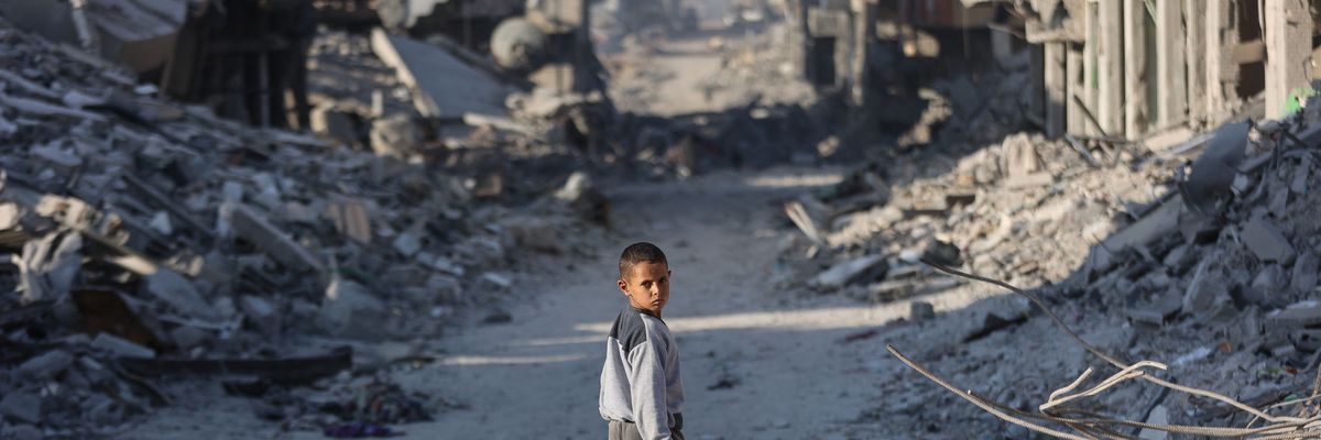 Boy in rubble of Gaza