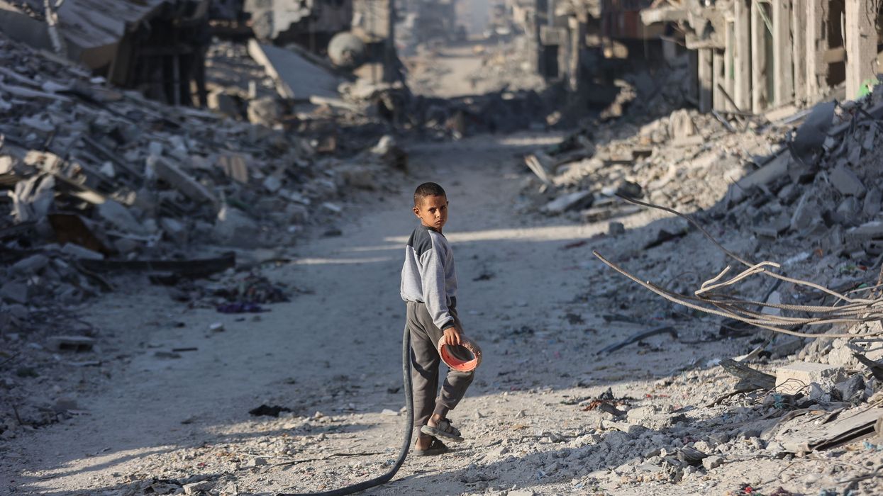 Boy in rubble of Gaza