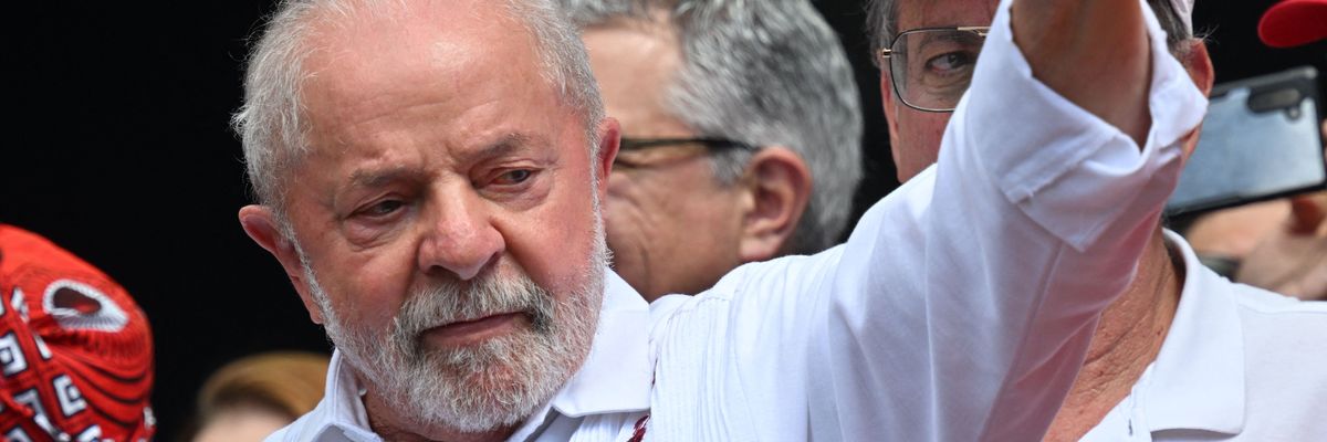 ​Brazilian President Luiz Inácio Lula da Silva raises his fist during a May Day rally in São Paulo on May 1, 2023.