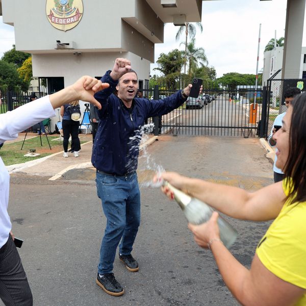 Brazilians celebrate Bolsonaro's arrest.