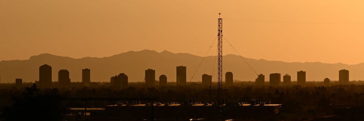 Buildings blur at sunset in a Phoenix, Arizona, heatwave. 