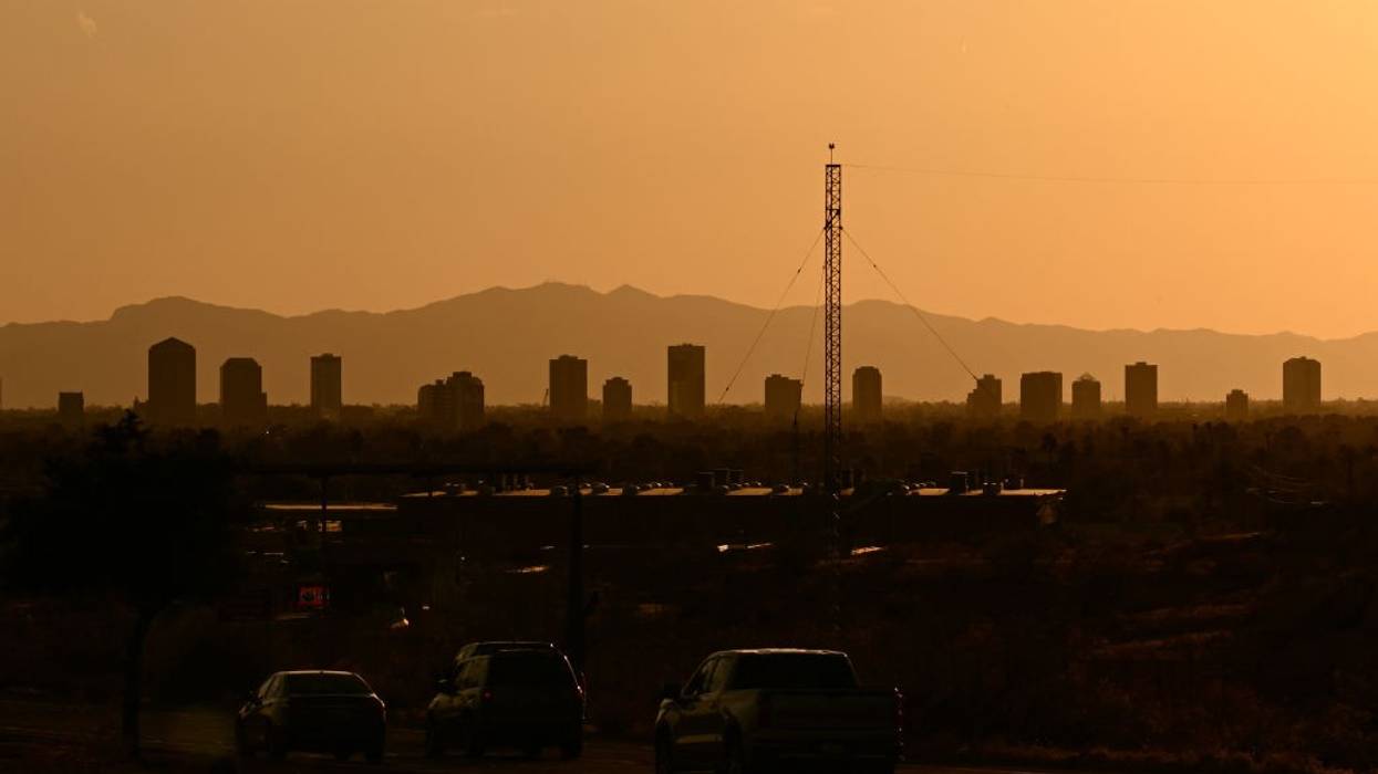 Buildings blur at sunset in a Phoenix, Arizona, heatwave.