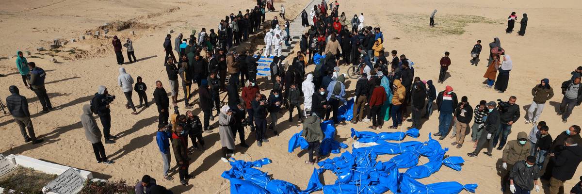 Burial of unidentified bodies in Gaza.