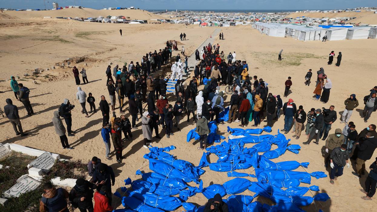 Burial of unidentified bodies in Gaza.