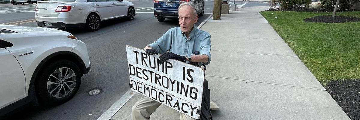 Burk Ketcham, who turned 100 years old protest