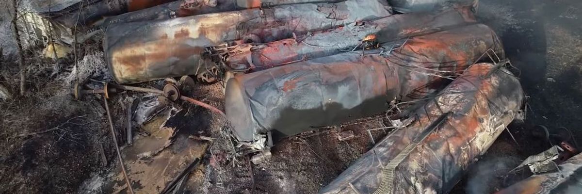 Burnt railway cars in East Palestine, Ohio following derailment disaster