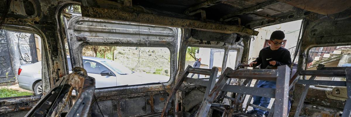 Burnt vehicle in West Bank.