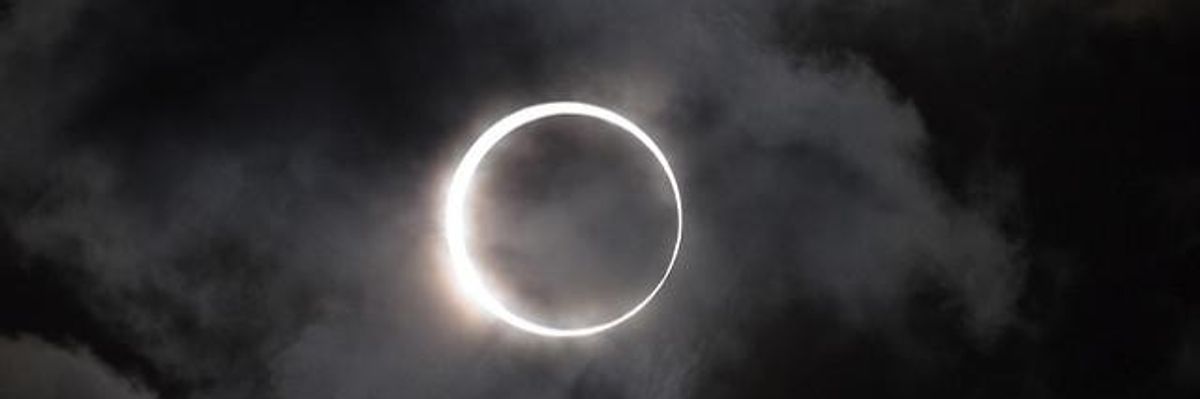 Why No Eclipse Denialists? The Same Science Predicts Global Heating
