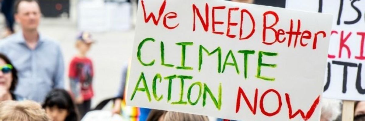 Campaigners demand far-reaching climate action at a rally.