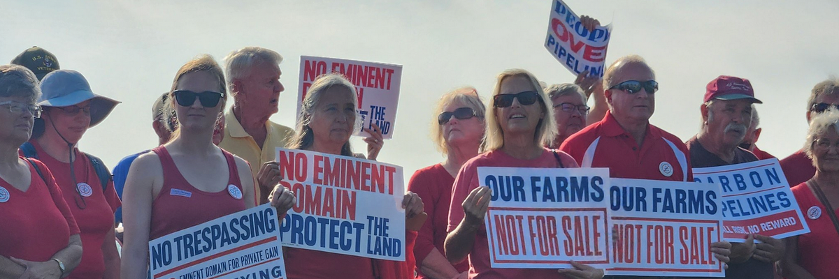 Campaigners gather to protest a carbon capture pipeline