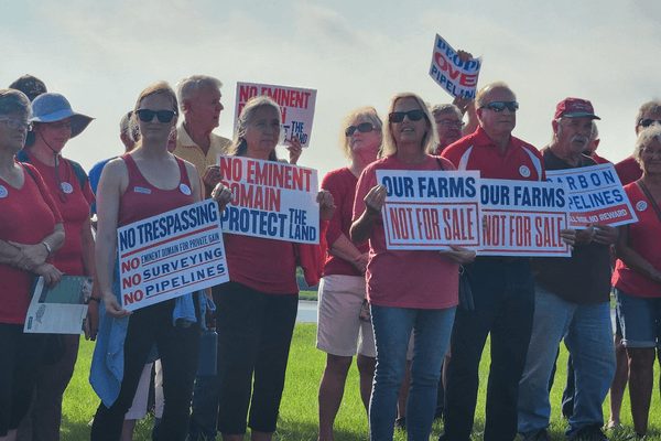 Campaigners gather to protest a carbon capture pipeline