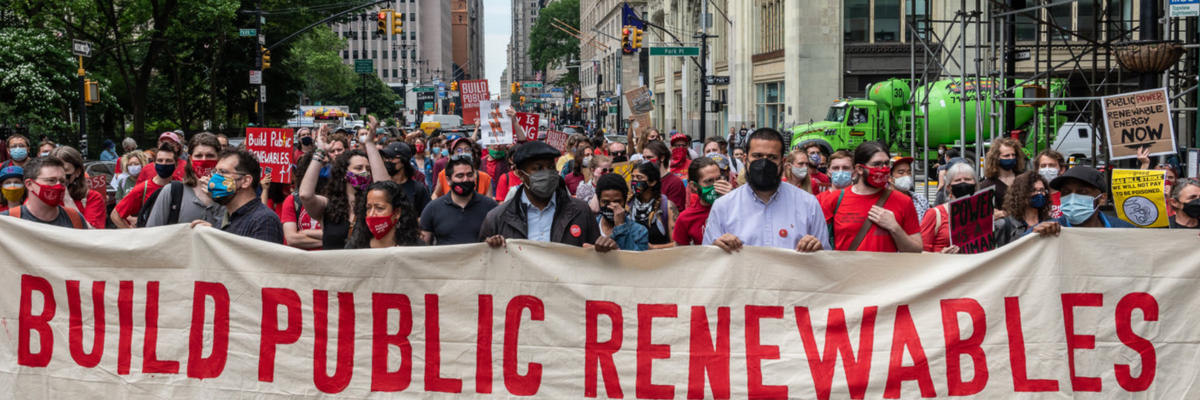 Campaigners with Public Power NY march in New York