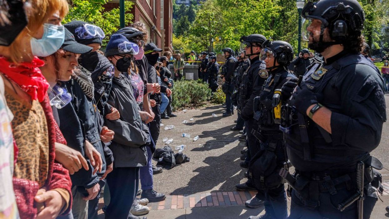 Campus protesters face off against police.