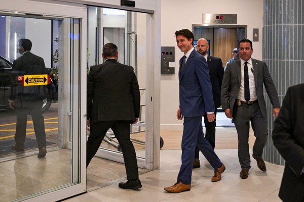 Canadian Prime Minister Justin Trudeau leaves his hotel to meet U.S. President-elect Donald Trump