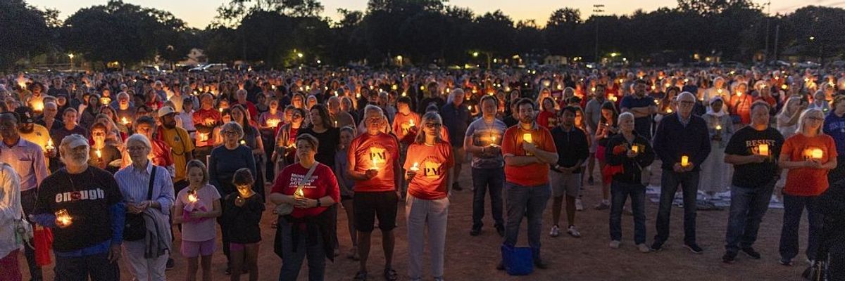 Candlelight vigil held for victims of Minneapolis Catholic school shooting