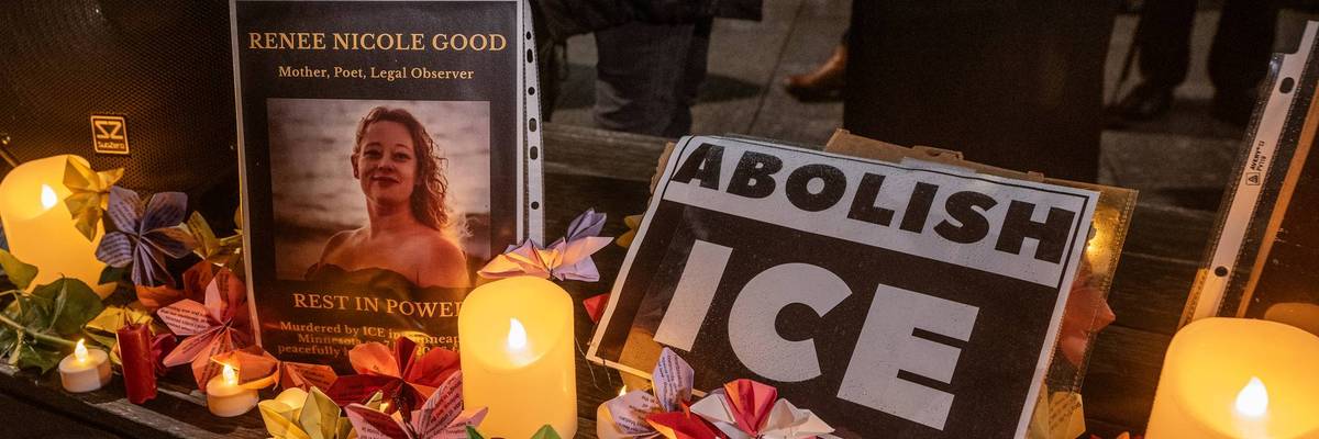 Candles are lit outside the US Embassy in London in memory...