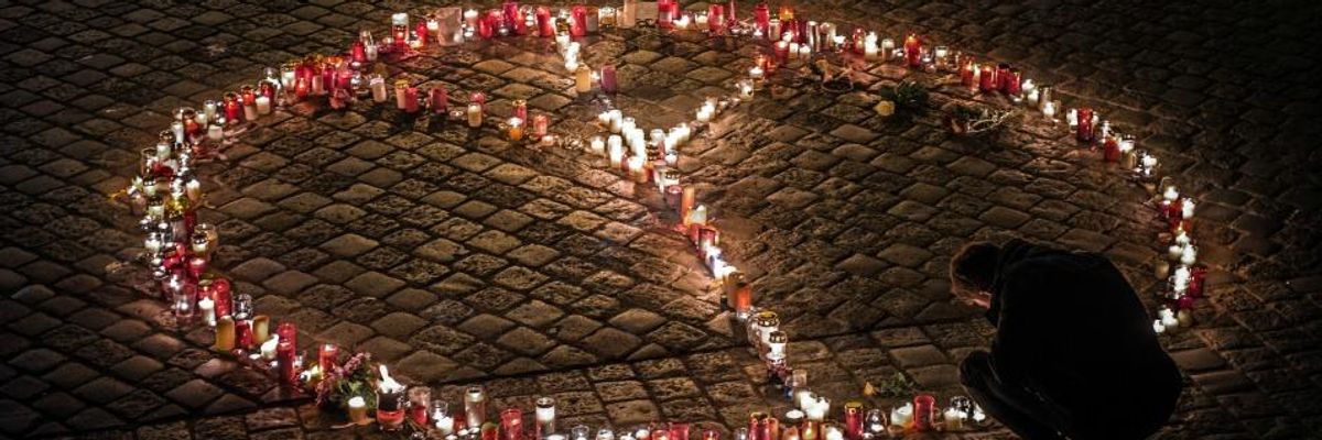Candles forming a peace sign